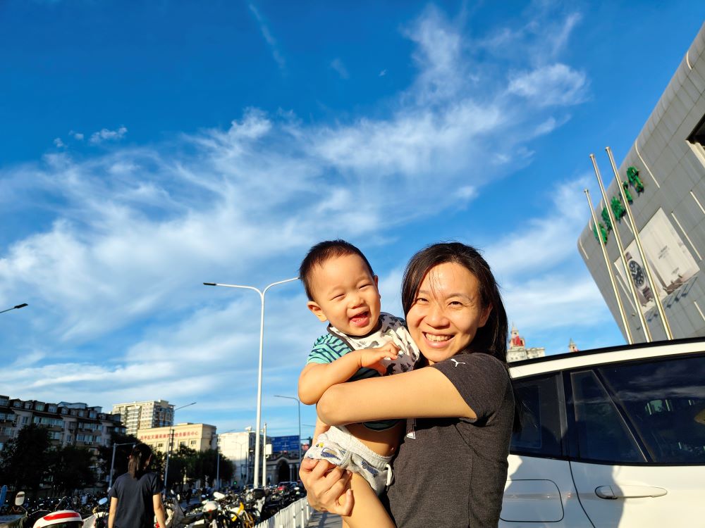 Mommy and me at the shopping mall parking lot in Beijing