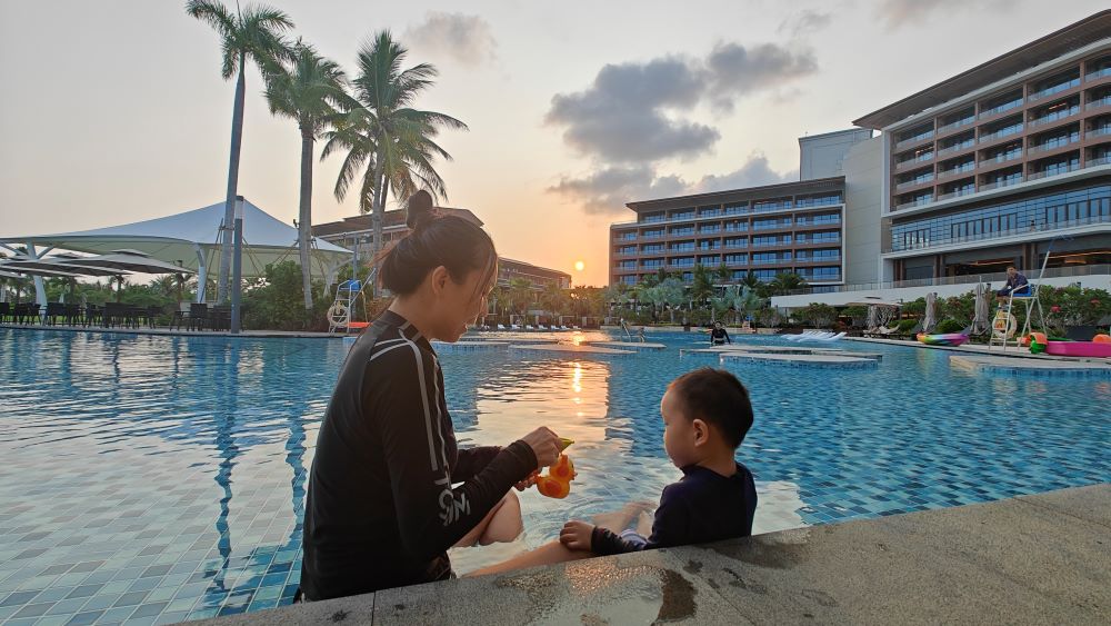 Mommy and me watching the sunset by the Hyatt pool!